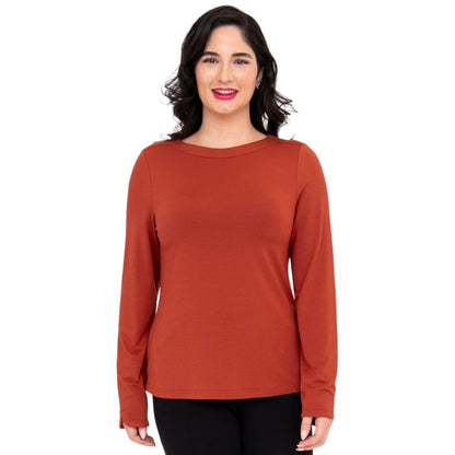 top of female model wearing mona cuprum orange long sleeve top front view on white background