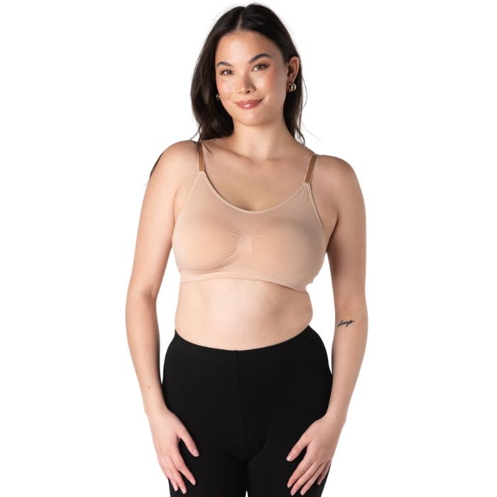 female model wearing beige brown seamless adjustable bralette front view on white background