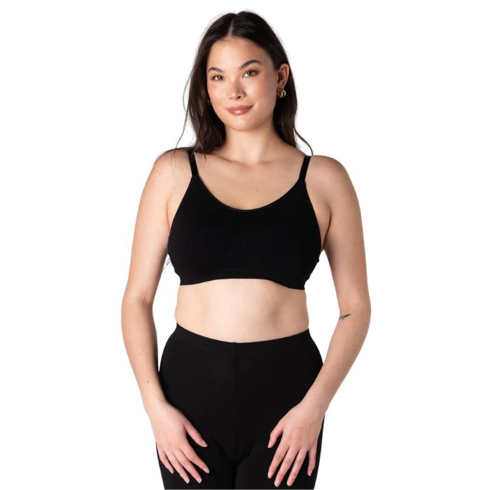 female model wearing black seamless adjustable bralette front view on white background