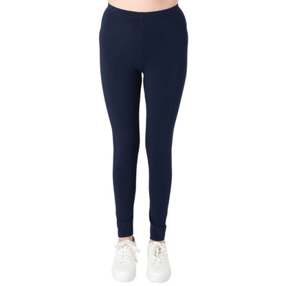 female model wearing ink blue suri full length leggings front view on white background 