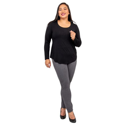 female model wearing tessa long sleeve top black and nadia granite grey pants front view on white background